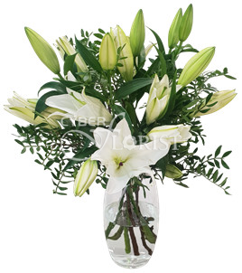 arrangement of lilies with greenery